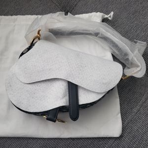 Like new dior mini saddle bag